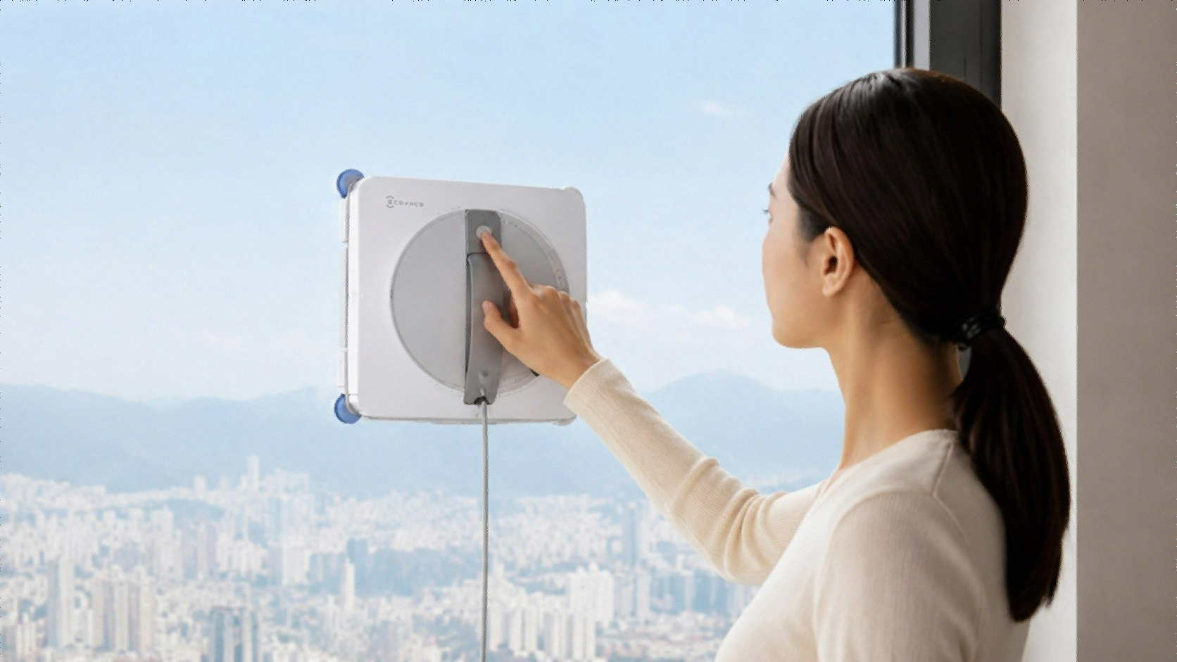 ECOVACS WINBOT W2S Omni window cleaning robot on glass surface